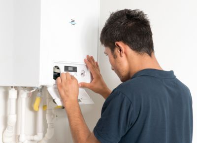 instalar un water heater de agua por un plomero